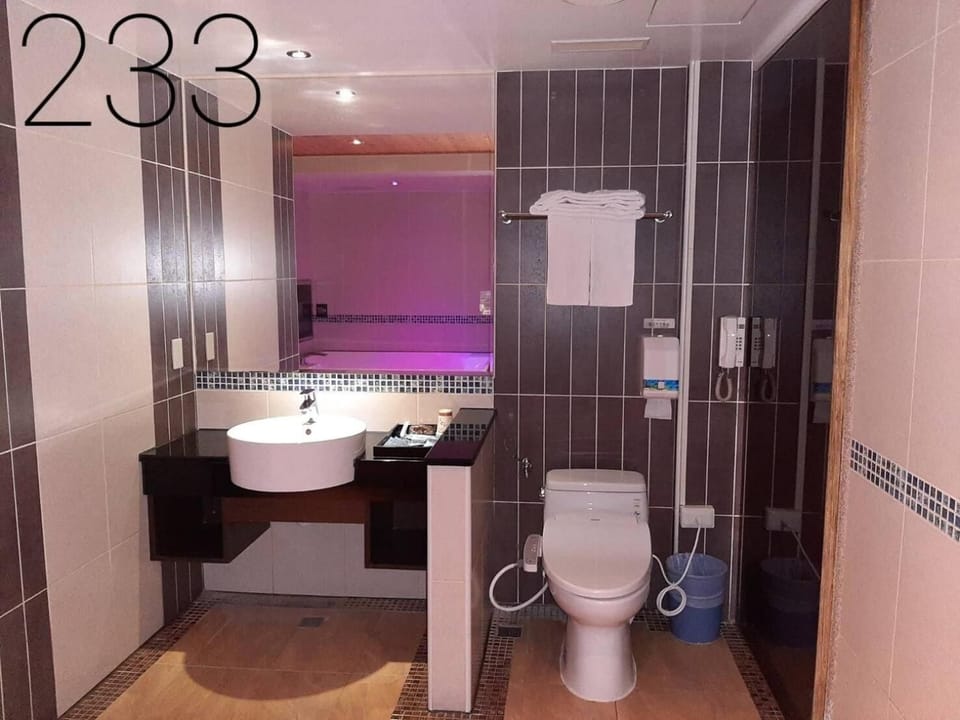 Separate tub and shower, free toiletries, hair dryer, slippers