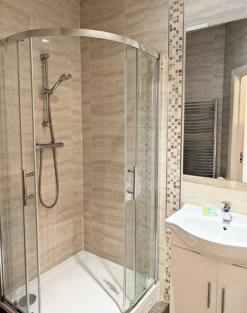 Shower, free toiletries, hair dryer, towels