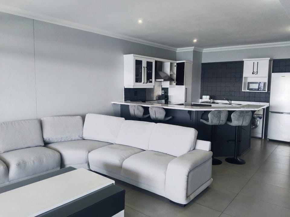 Apartment 504 | Living area | Flat-screen TV
