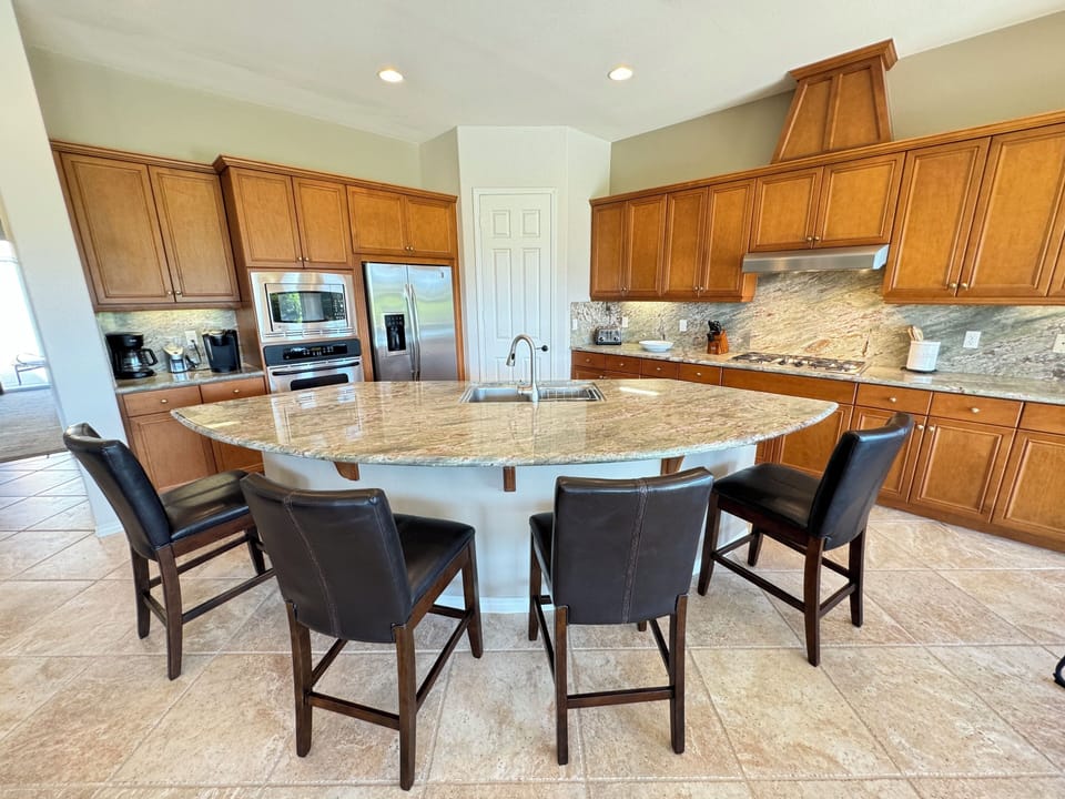 Kitchen counter and bar stools