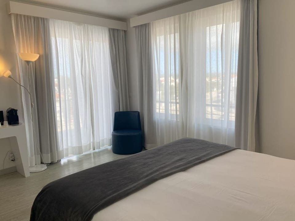 Double Room, Terrace, City View | Minibar, blackout drapes, iron/ironing board (on request), WiFi (free)