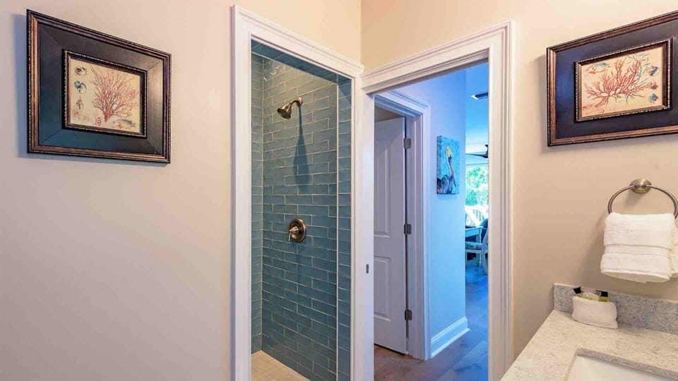 A jack and jill bathroom connects to the first bedroom and to the living area...