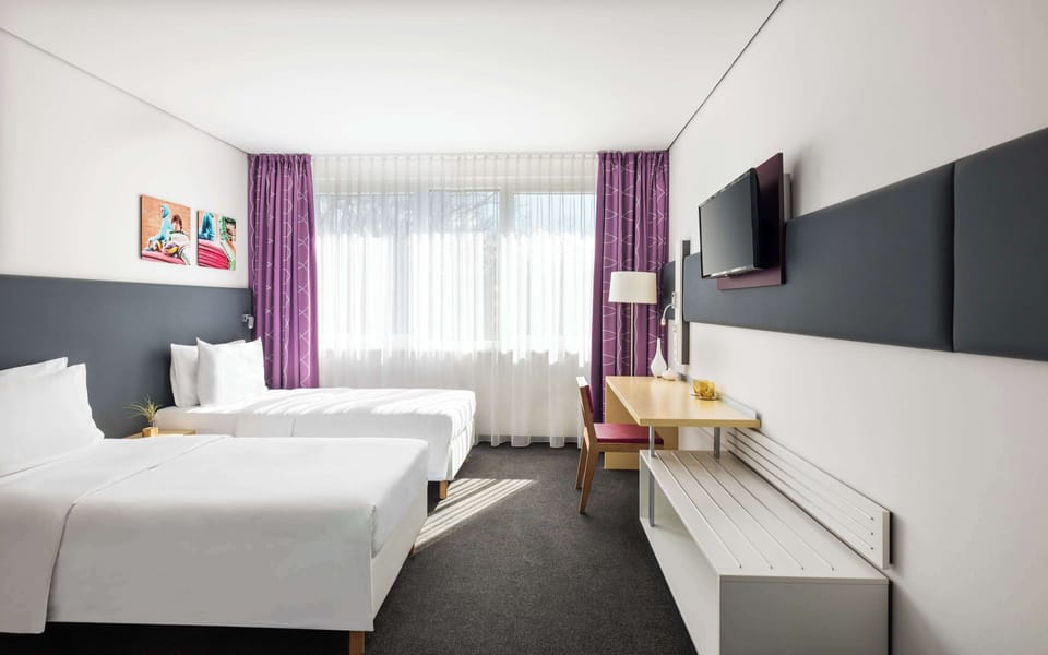Hypo-allergenic bedding, in-room safe, desk, laptop workspace