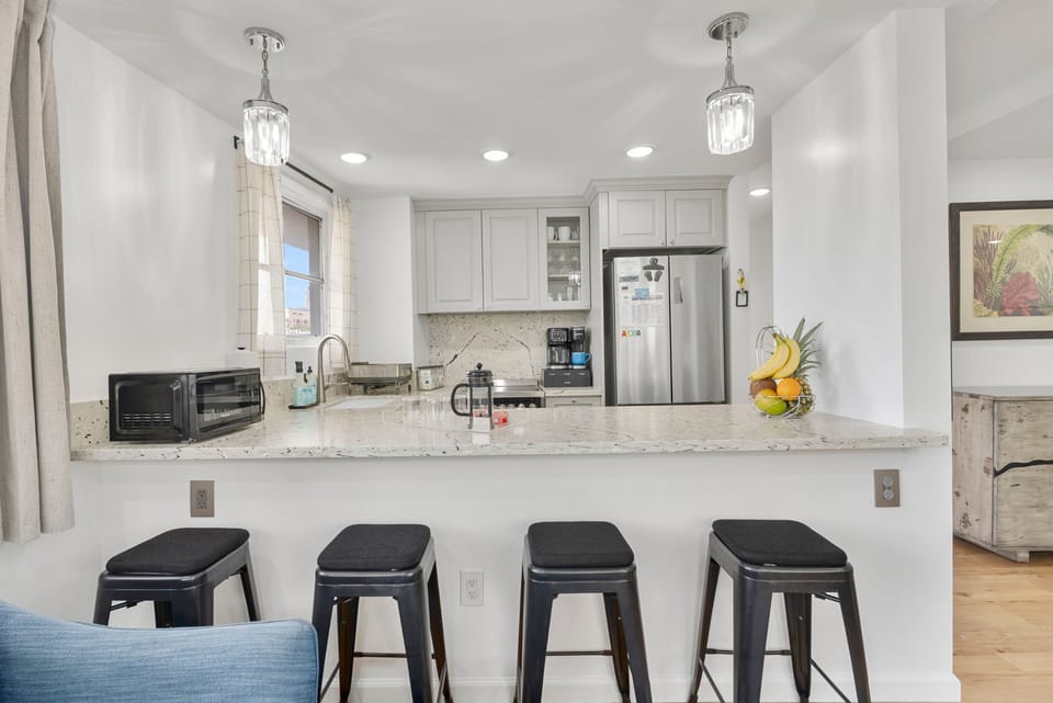 Modern kitchen with Keurig, French press & everything needed to cook.