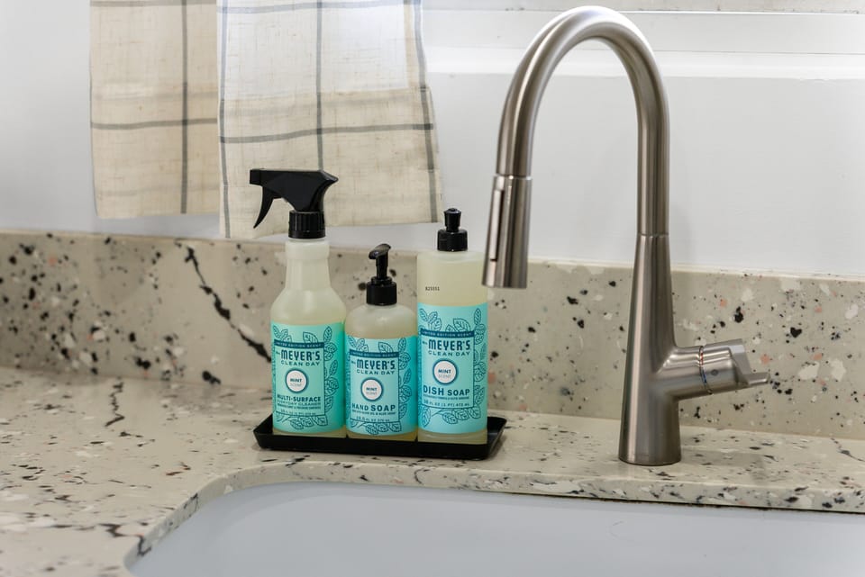 Deep sink & pull-down faucet make meal prep & cleanup easy.