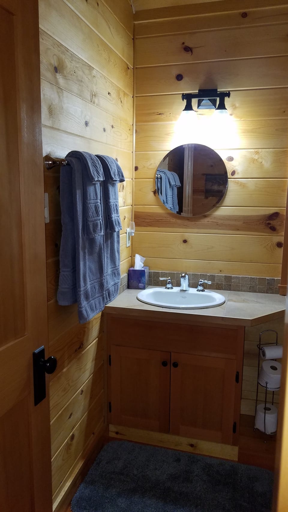 Full bath with shower in the hall.