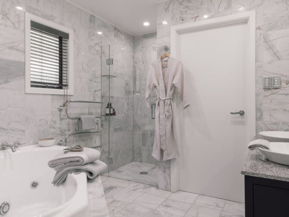 Master Villa | Bathroom | Rainfall showerhead, free toiletries, hair dryer, bathrobes