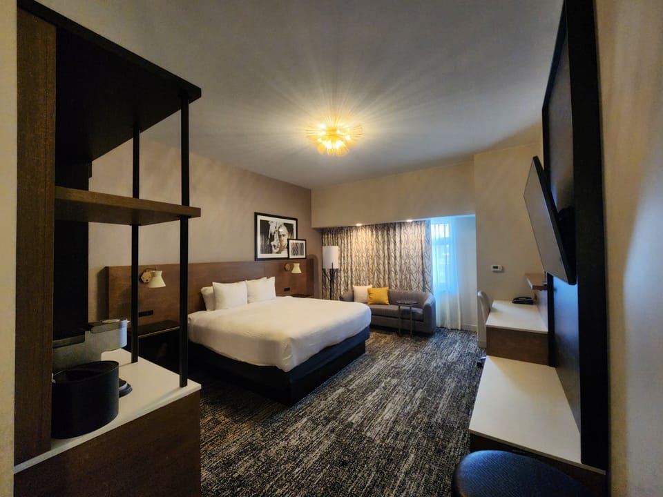 Standard King (21 & older only) | Premium bedding, down comforters, pillowtop beds, laptop workspace