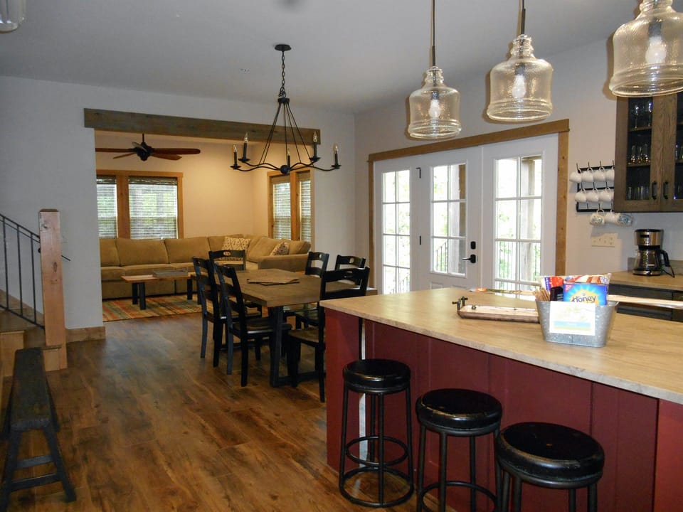 kitchen, dining, leads to stairs to go up or over to living room