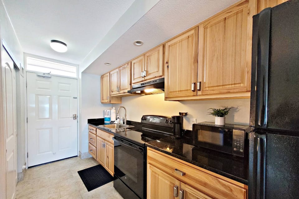 Brand new kitchen nicely stocked to make your own meals during your stay.