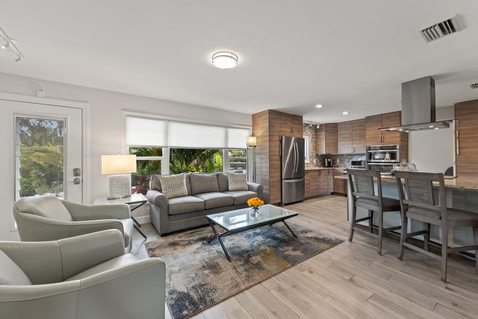 Bright, open living area with plush seating and serene views.