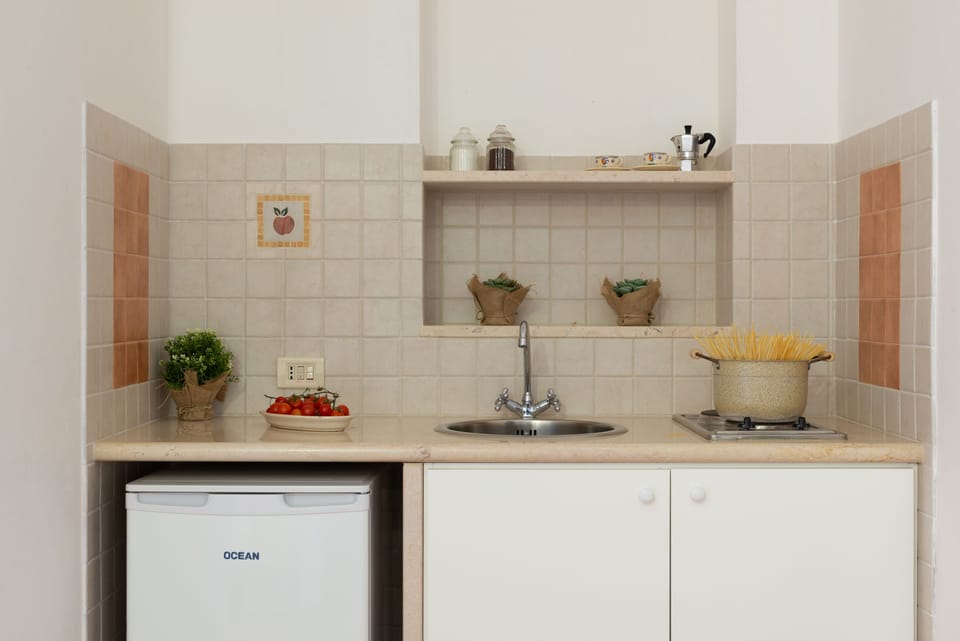 Apartment, 3 Bedrooms | Private kitchenette | Full-size fridge, oven, stovetop, dishwasher