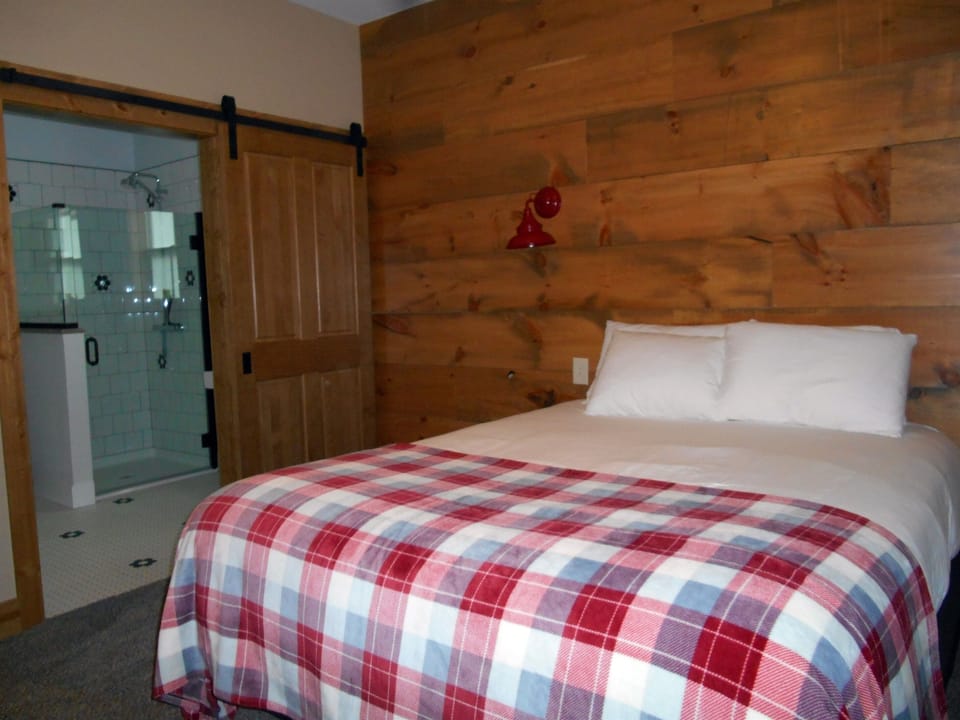 Main floor queen with ensuite bath.