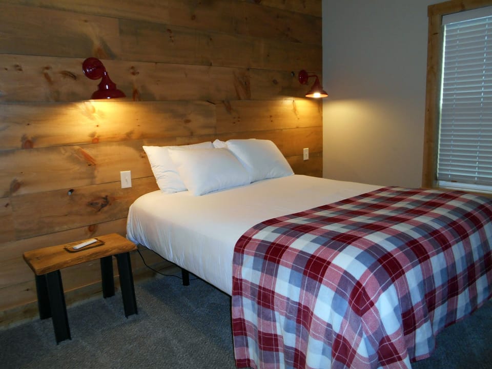 Main floor queen with adjustable bed.