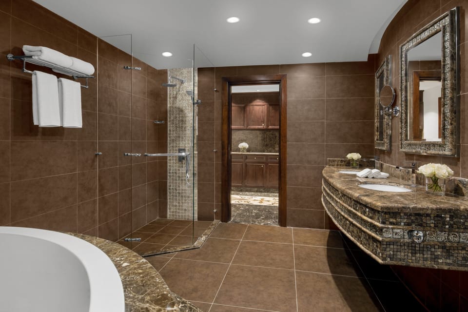 Suite, 1 Bedroom, Non Smoking (Living, Dining) | Bathroom | Combined shower/tub, free toiletries, hair dryer, bathrobes