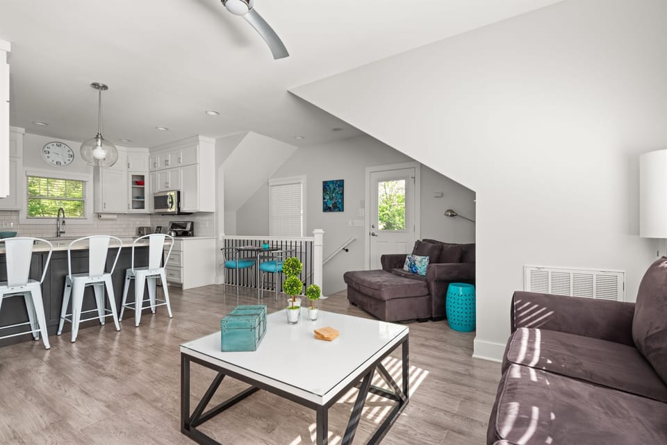 Open living room/kitchen concept ... exit the door on the right for the back balcony