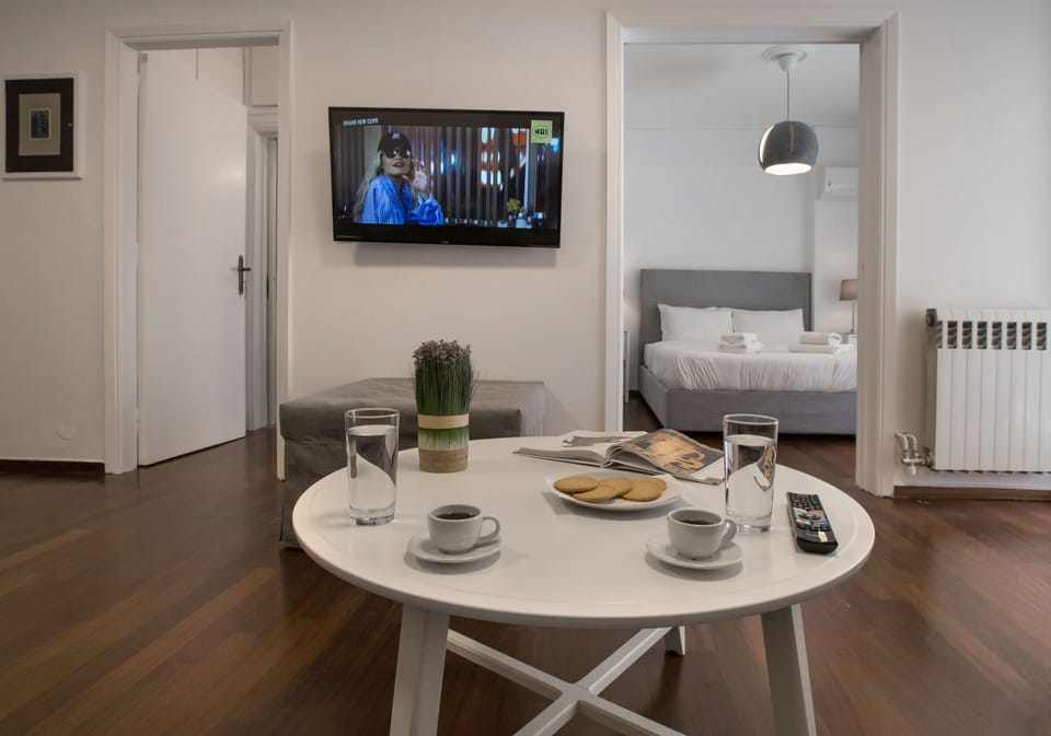 Apartment, 1 Bedroom | Living area | TV