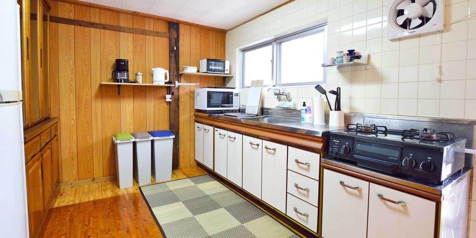 Vacation Home | Private kitchen | Coffee/tea maker, full-size fridge, microwave, oven