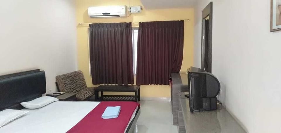 Deluxe AC Double Bed | In-room safe, blackout drapes, bed sheets