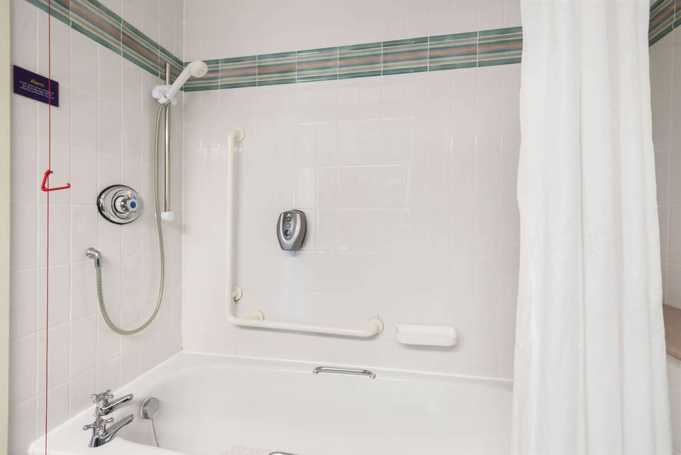 Combined shower/tub, eco-friendly toiletries, hair dryer, towels
