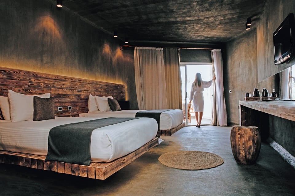 Merakilous Room Partial Sea View | 1 bedroom, minibar, in-room safe, individually furnished
