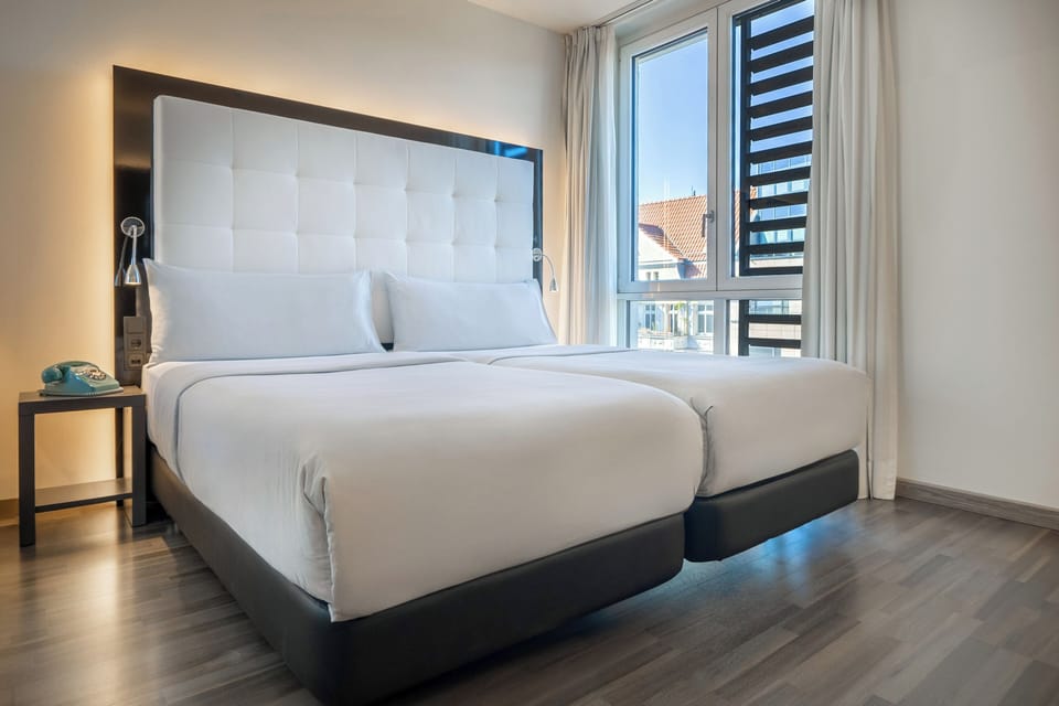 The INNSIDE Room | Minibar, in-room safe, desk, blackout drapes