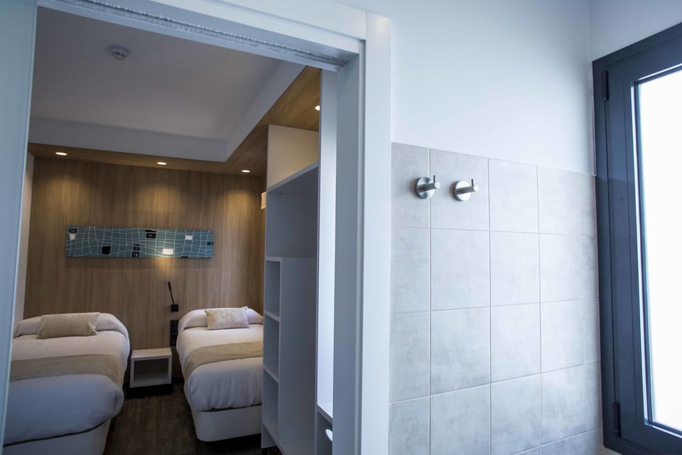 Twin Room, Private Bathroom | Premium bedding, down comforters, memory foam beds, desk