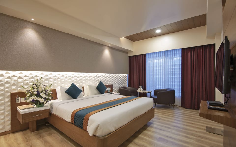 Suite | Down comforters, memory foam beds, minibar, in-room safe