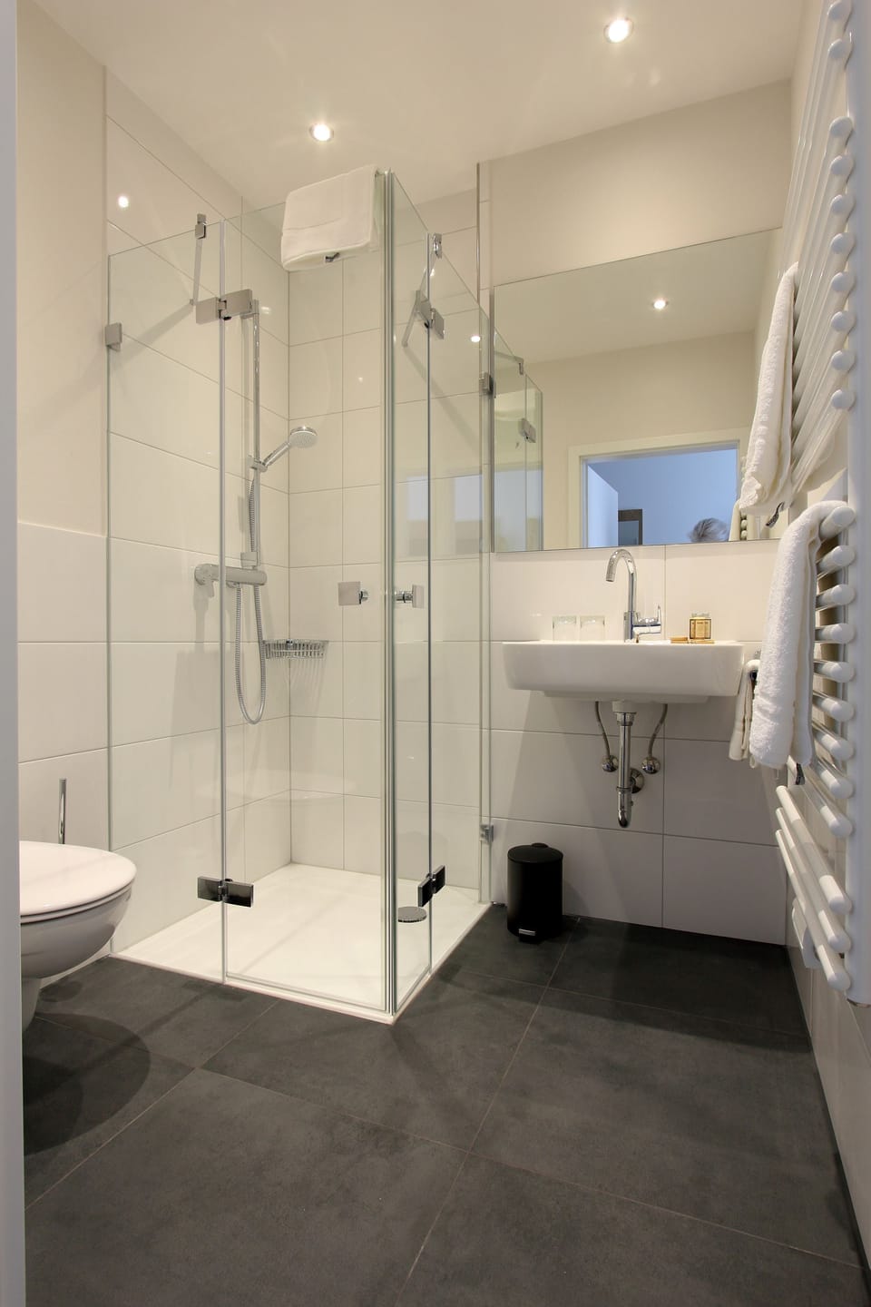 Shower, rainfall showerhead, towels