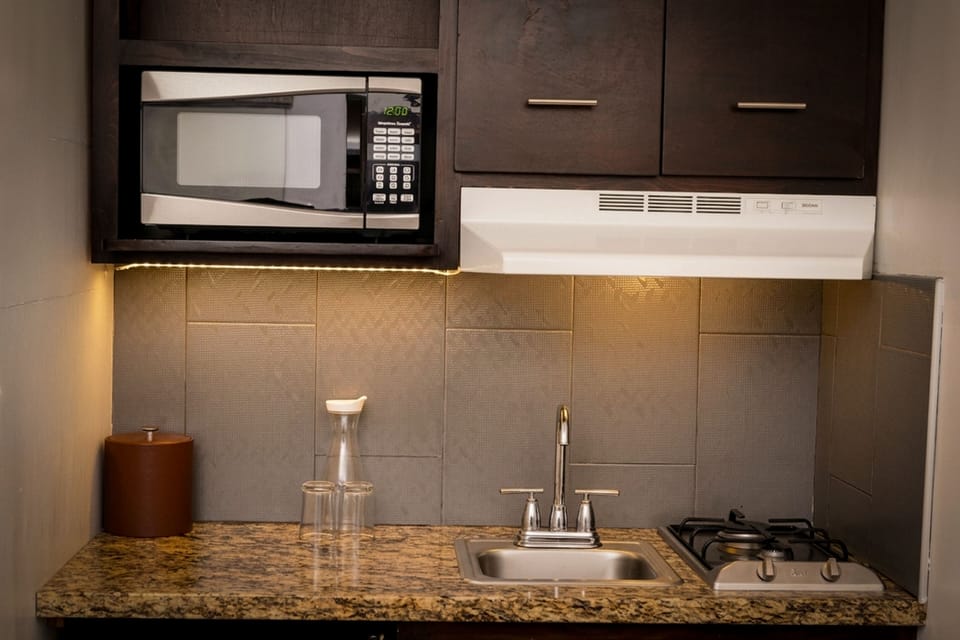 Standard Suite, Multiple Beds, Kitchenette | Private kitchenette | Coffee/tea maker
