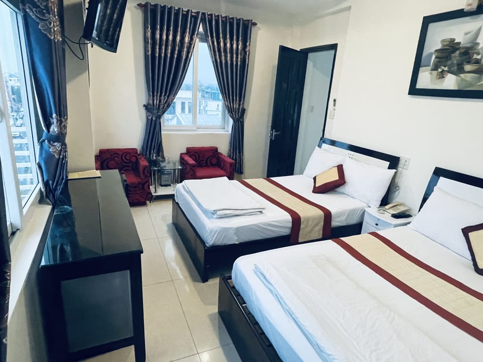 Deluxe Room, Balcony, City View | Minibar, desk, free WiFi