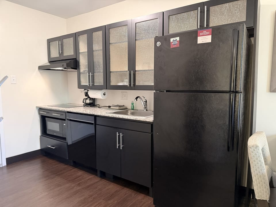 Studio Suite, 1 Queen Bed (Accessible Tub) | Private kitchen | Full-size fridge, microwave, stovetop, dishwasher