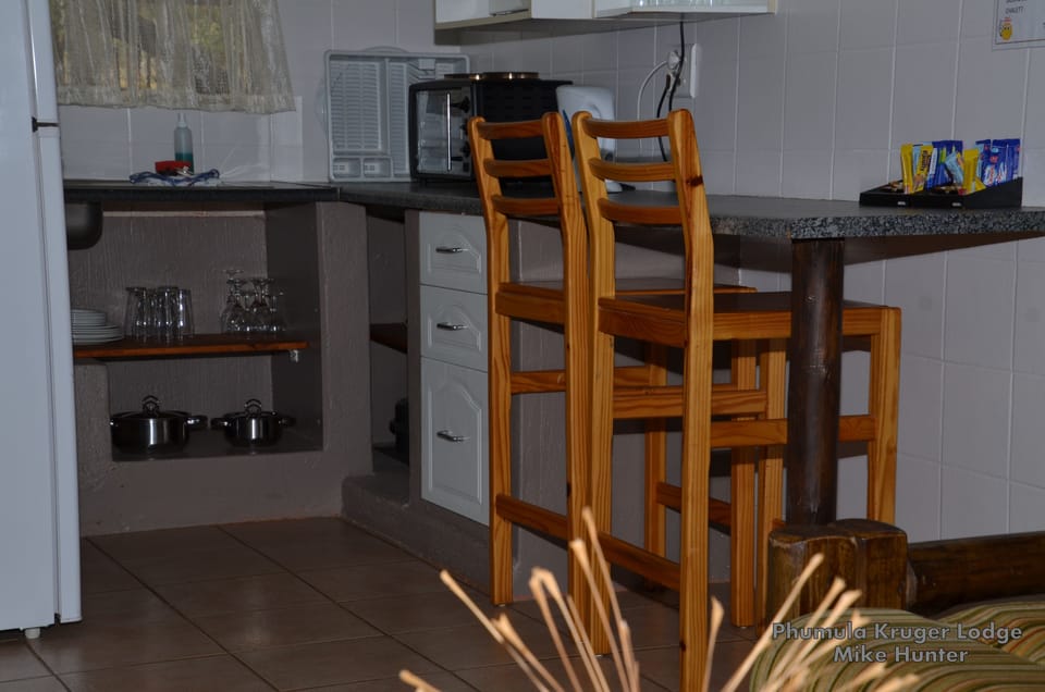 Fridge, microwave, stovetop, cookware/dishes/utensils