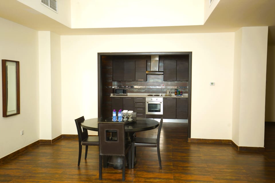 Family Suite, 3 Bedrooms, City View | Living area | 40-inch LCD TV with satellite channels, TV