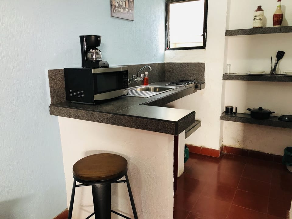 Standard Room | Private kitchen | Fridge, microwave, stovetop, cookware/dishes/utensils