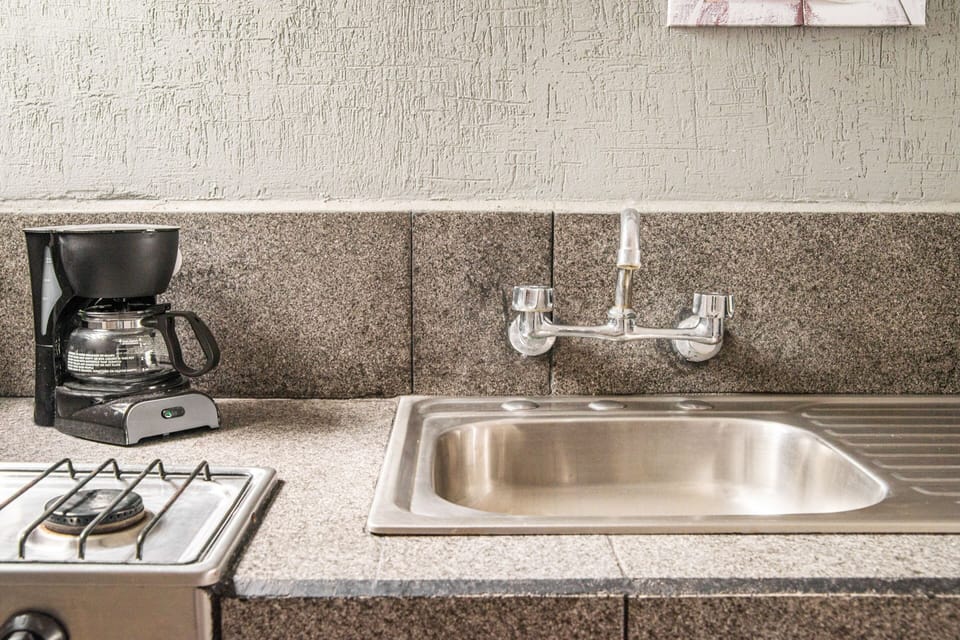 Standard Room | Private kitchenette | Fridge, microwave, stovetop, cookware/dishes/utensils