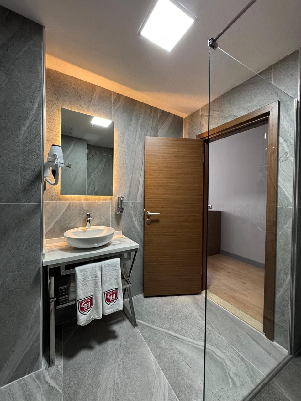 Shower, free toiletries, hair dryer, slippers