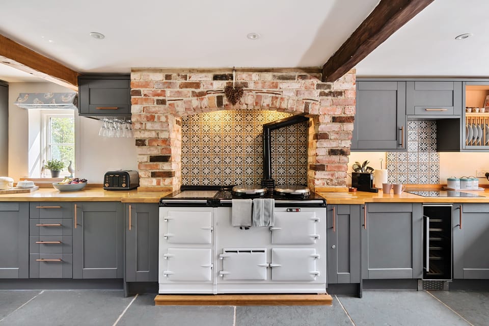Lanes End Cottage, near Cattistock: The family kitchen complete with Aga