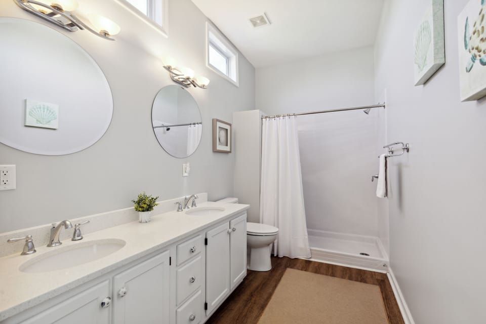 Upstairs private bathroom with double vanity