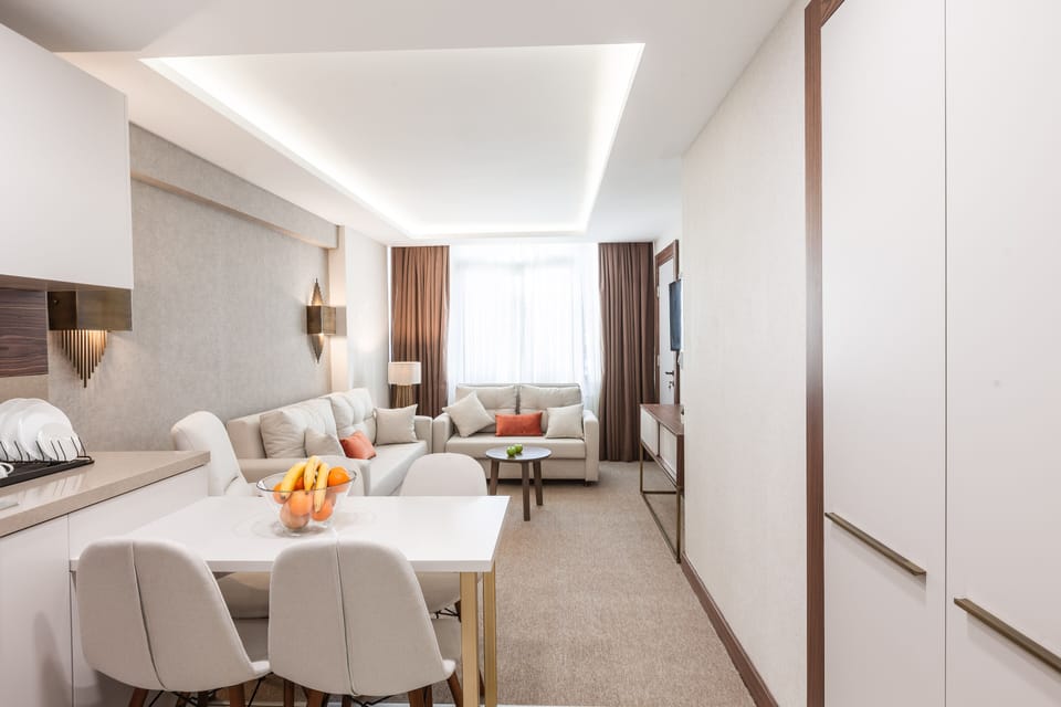 Family Apartment, 2 Bedrooms | Living room | 40-inch LED TV with satellite channels, TV