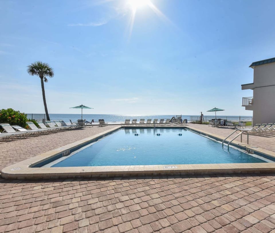 Resort-style pool area to enjoy, right on the beach.