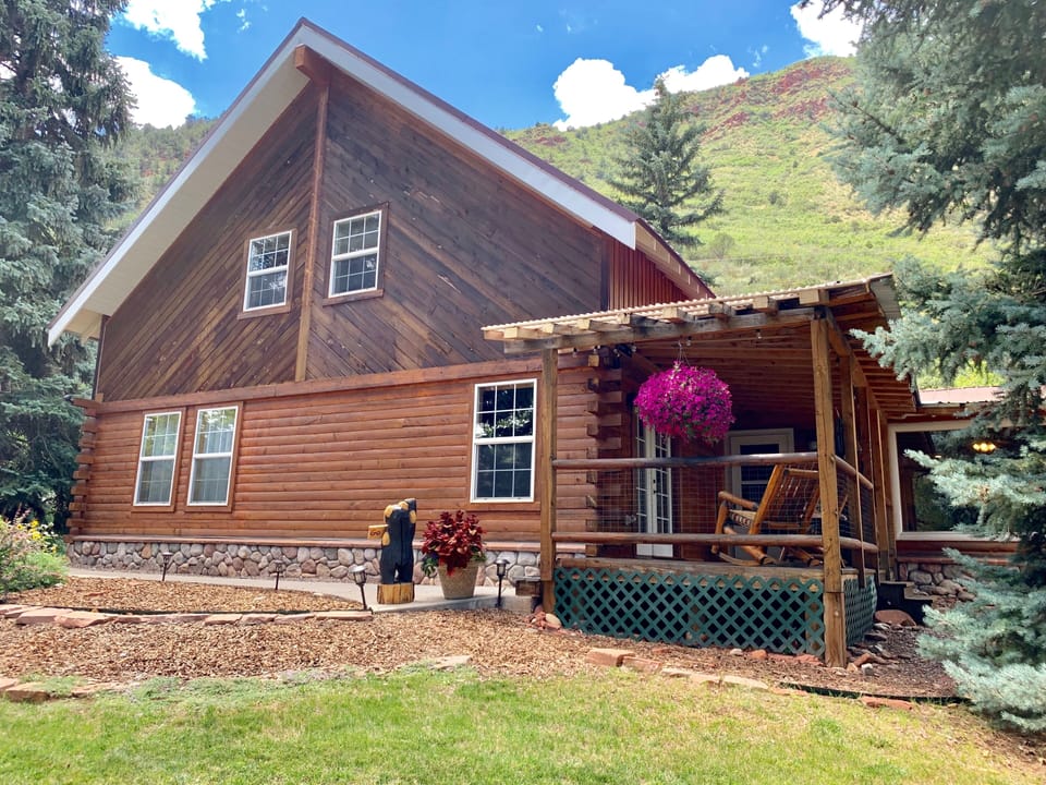 Beautiful house across from the river with beautiful outdoor spaces to enjoy