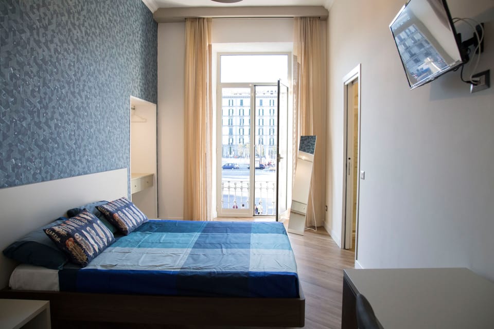 Deluxe Double or Twin Room, City View | In-room safe, desk, laptop workspace, blackout drapes