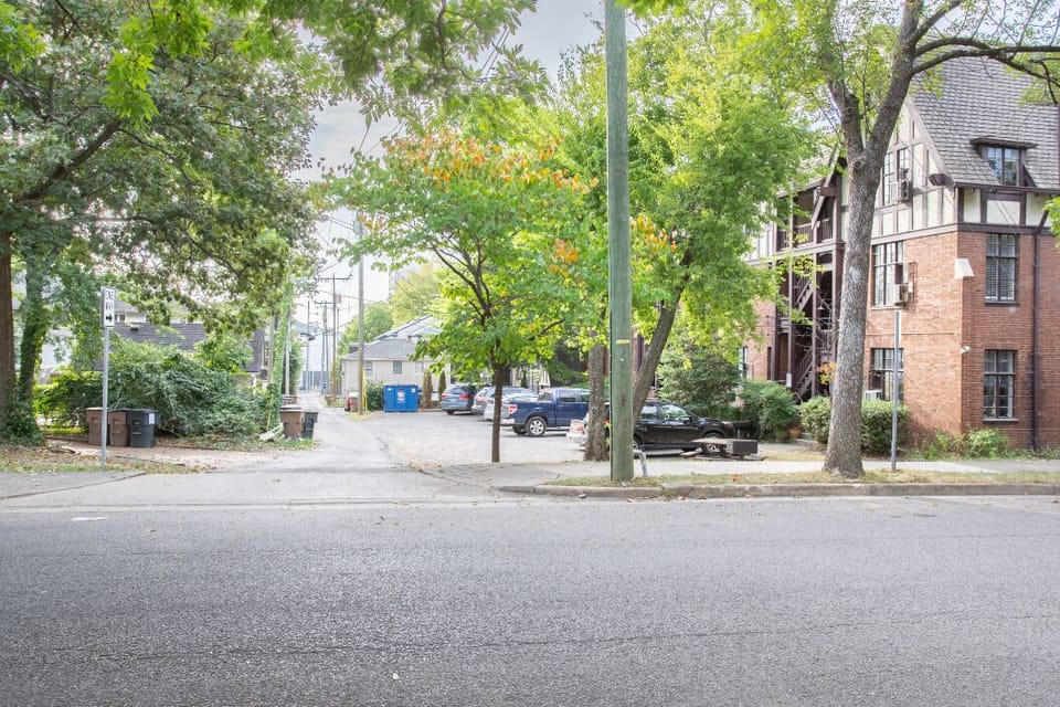 Parking is found by traveling west via the one-way alley off 19th street.
