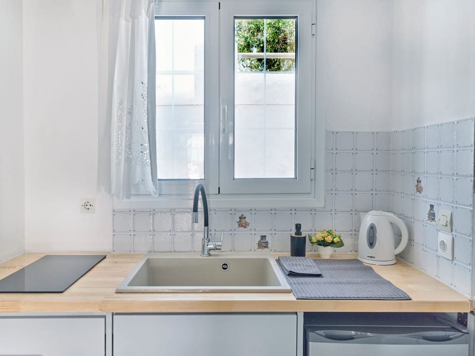 Premium Apartment, Pool View (4 Adults) | Private kitchen | Dining tables
