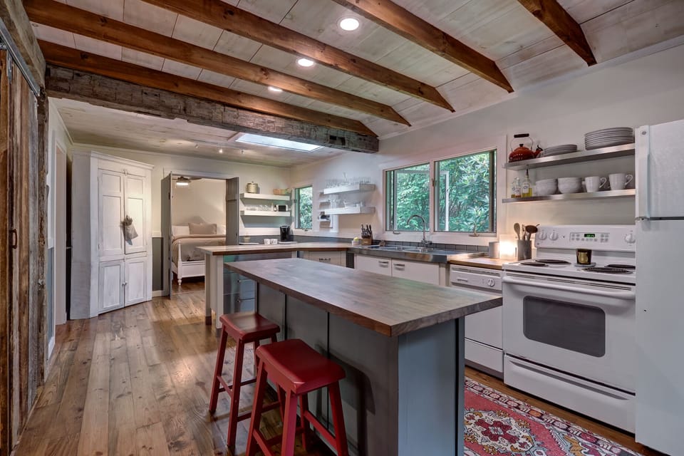 Open kitchen with exposed beams