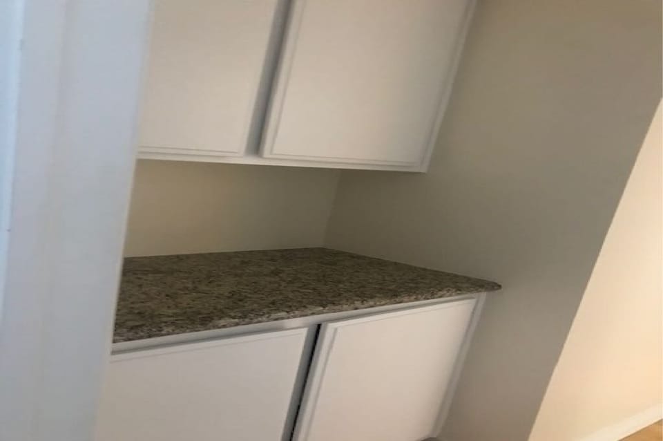Linen closet next to the second bedroom "in the hallway".

