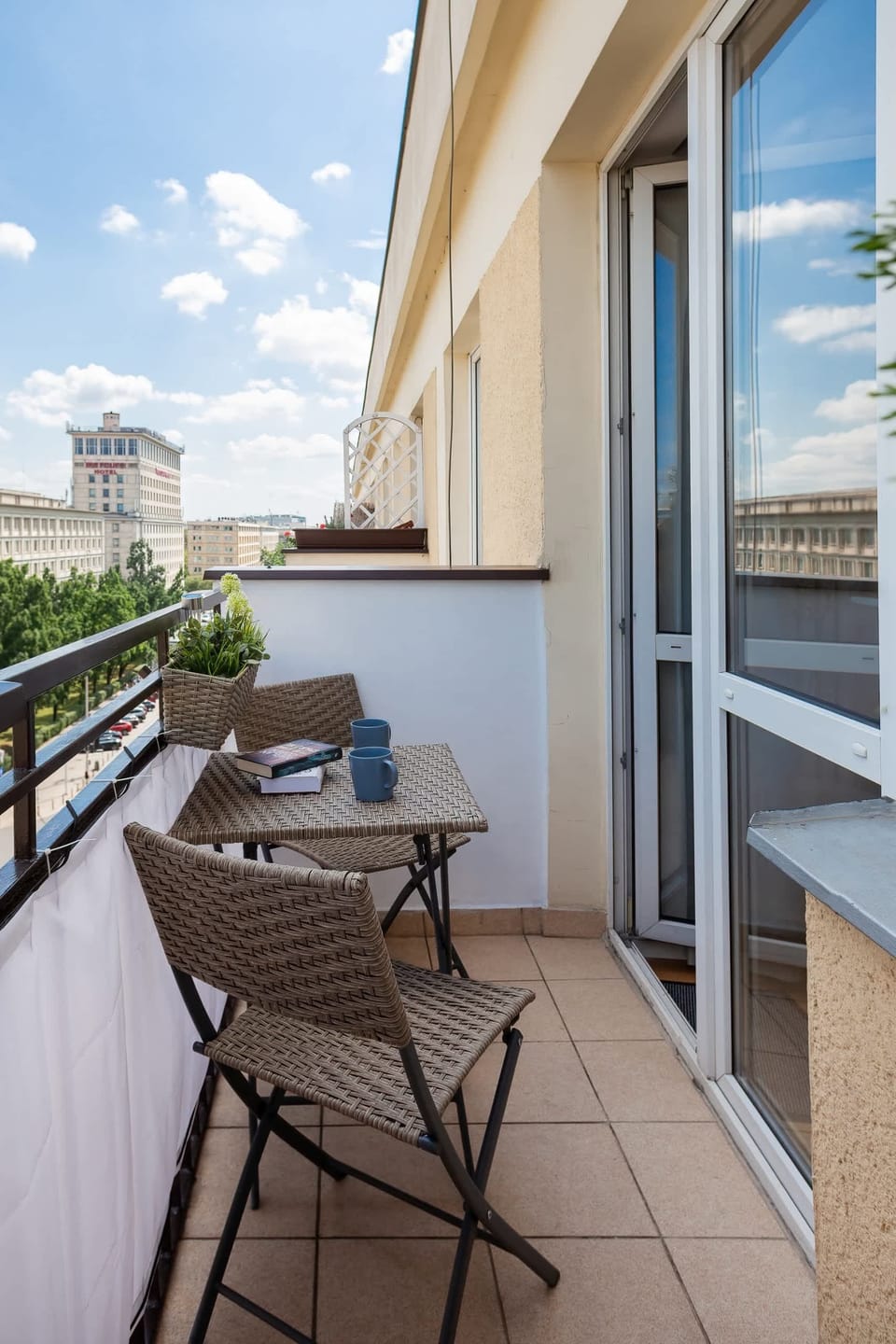 Balcony with garden furniture.