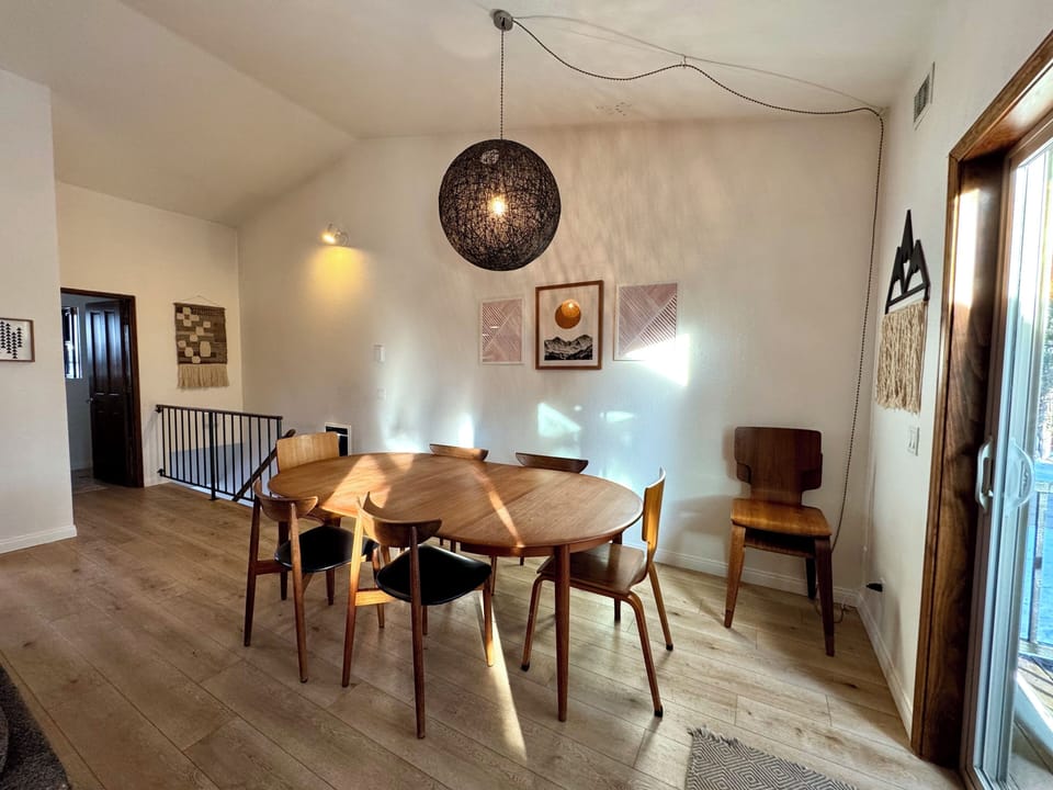 Dining room table with seating for 6 - 8 people.