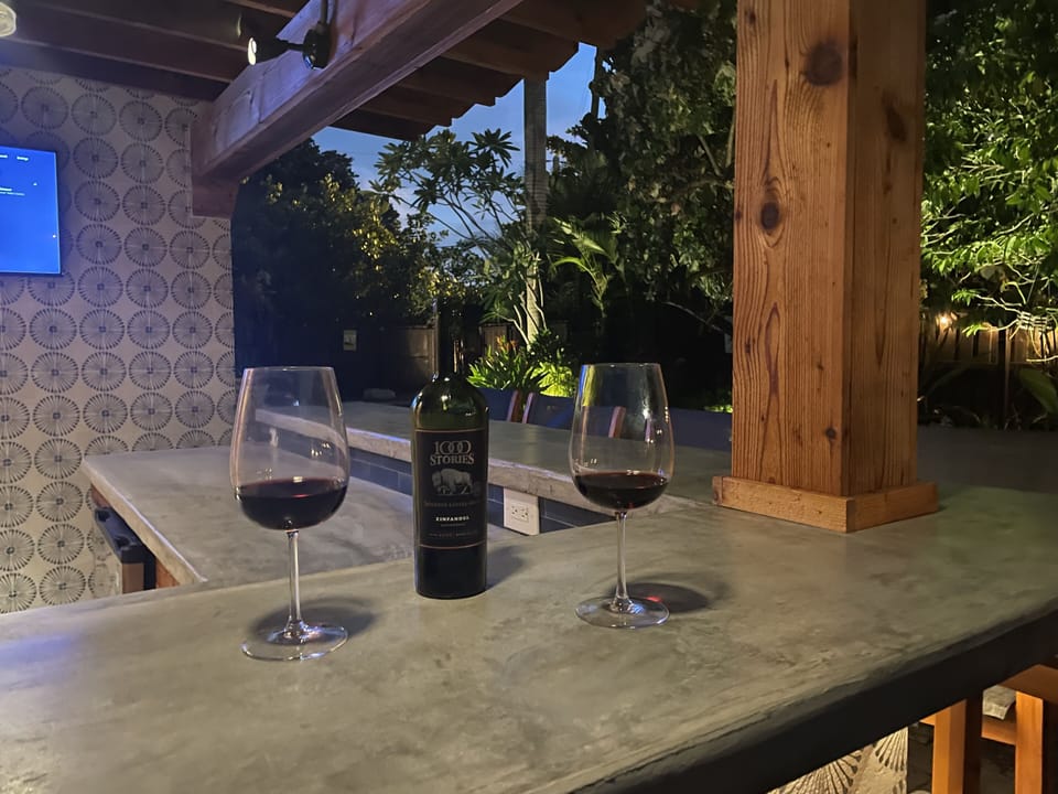 drink at the bar while you watch tv and your family in the pool!